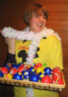 A Disney VoluntEAR preparing to decorate the Christmas tree