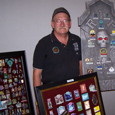 Collector Terry Higgins shows off his spectacular Haunted Mansion pin collection.