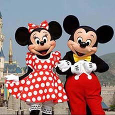 Mickey Mouse and Minnie Mouse in front of the Sleeping Beauty Castle