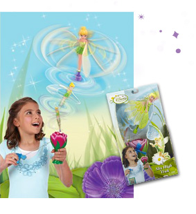 Girl playing with Sky High Tink doll