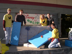 Disney VoluntEARS collect gifts for the Adopt-A-Family program.